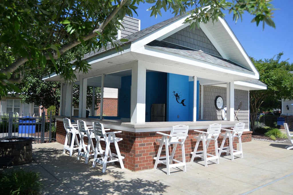 poolside entertaining and social hangout space with seating for friends and family