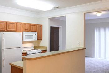 Open kitchens include built-in microwave, bistro bar & pantry