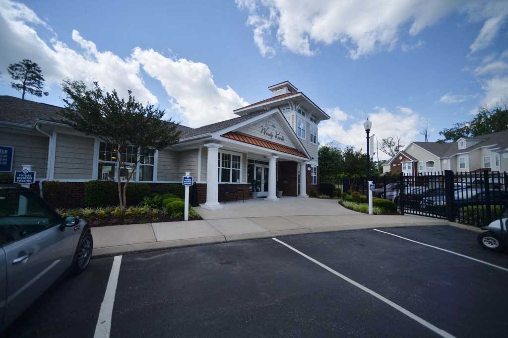 clubhouse exterior of 700 Acqua Apartments at Windy Knolls in Newport News