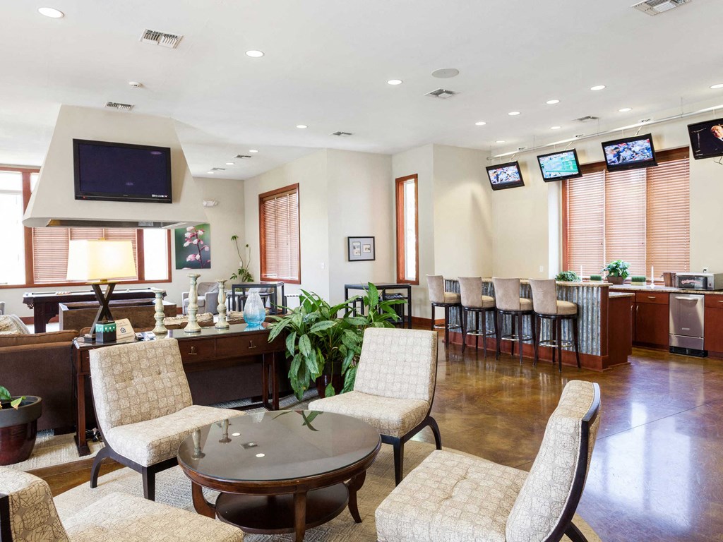 interiour clubhouse lounge area at 1200 Acqua Apartment