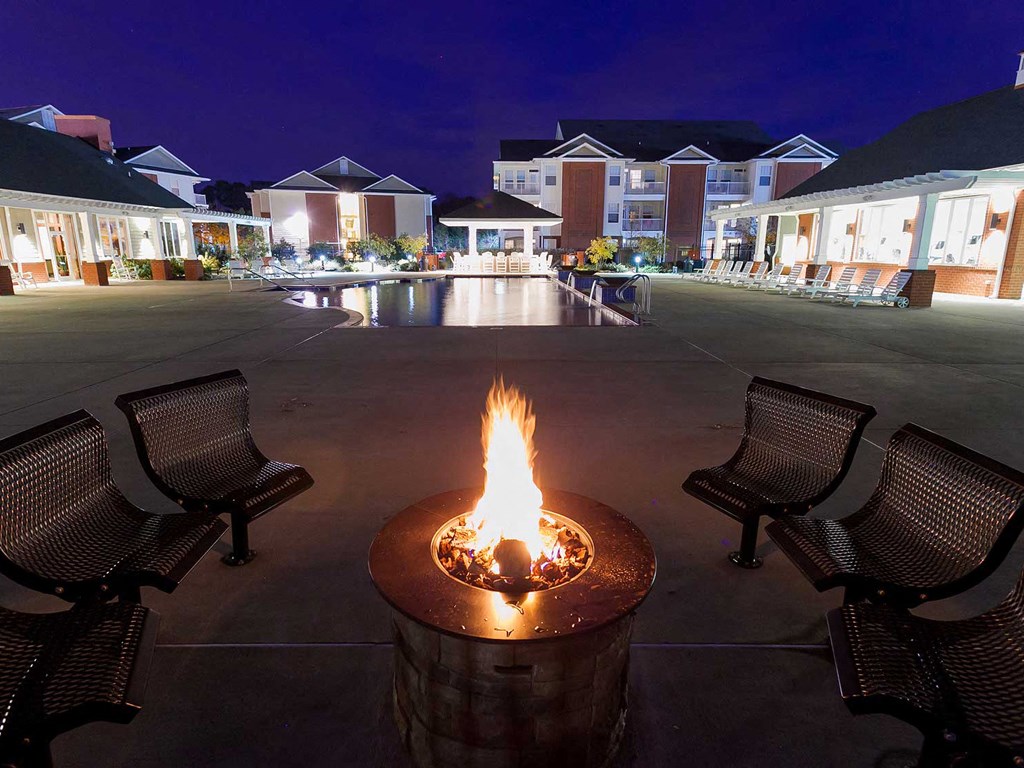 outdoor firepit at night social and entertaining spaces at 1200 Acqua
