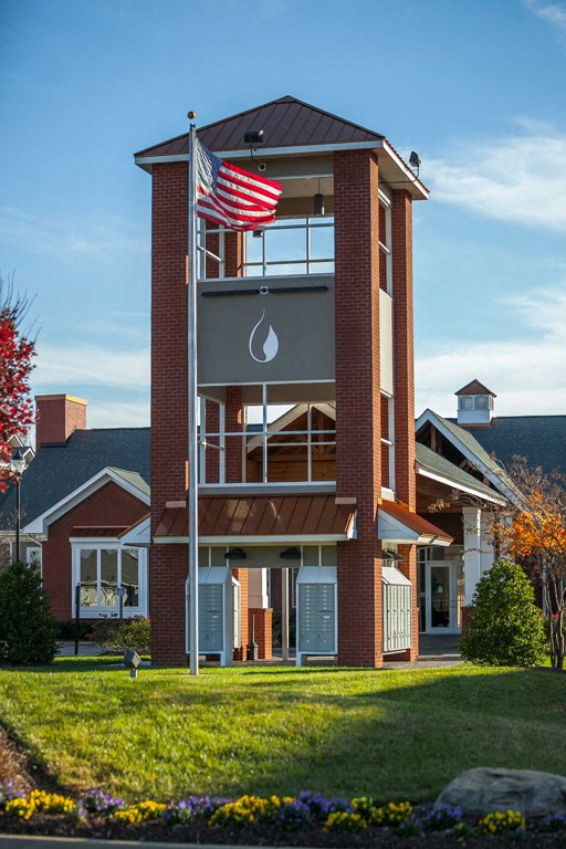 entrance tower with waterdrop logo at main entrance to 1200 Acqua