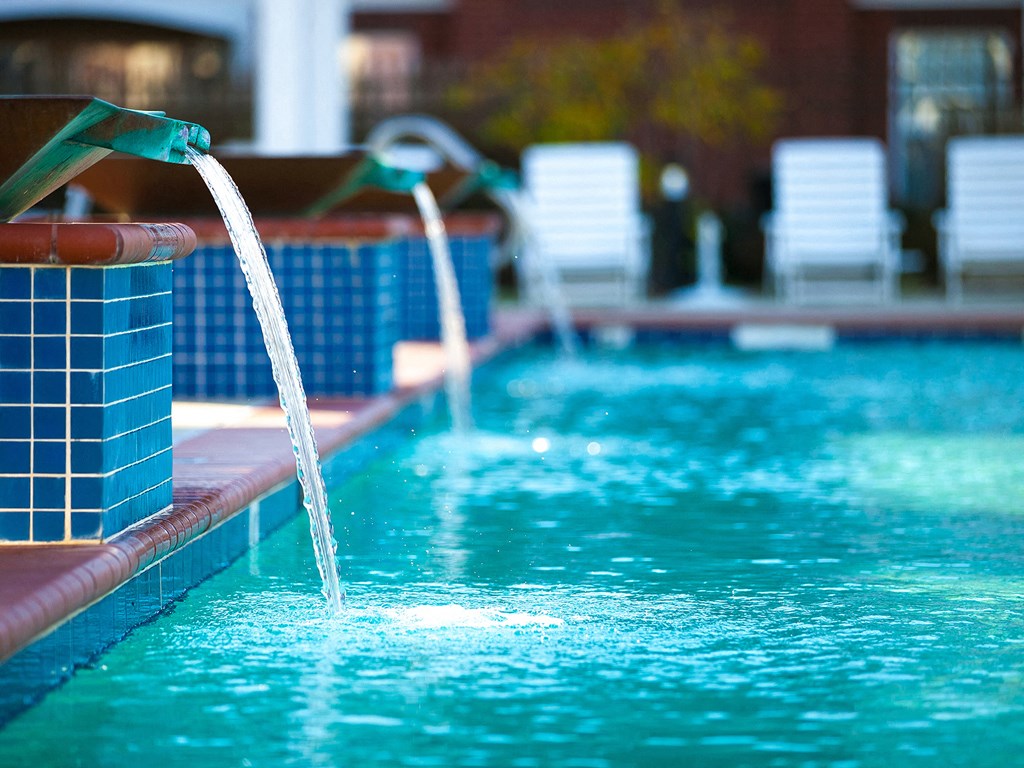 water features pour into the pool at 1200 Acqua