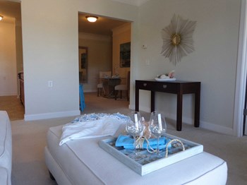 Alternate Angle Living Room alternate angle of living room in decorated model at 900 Acqua - Photo Gallery 2