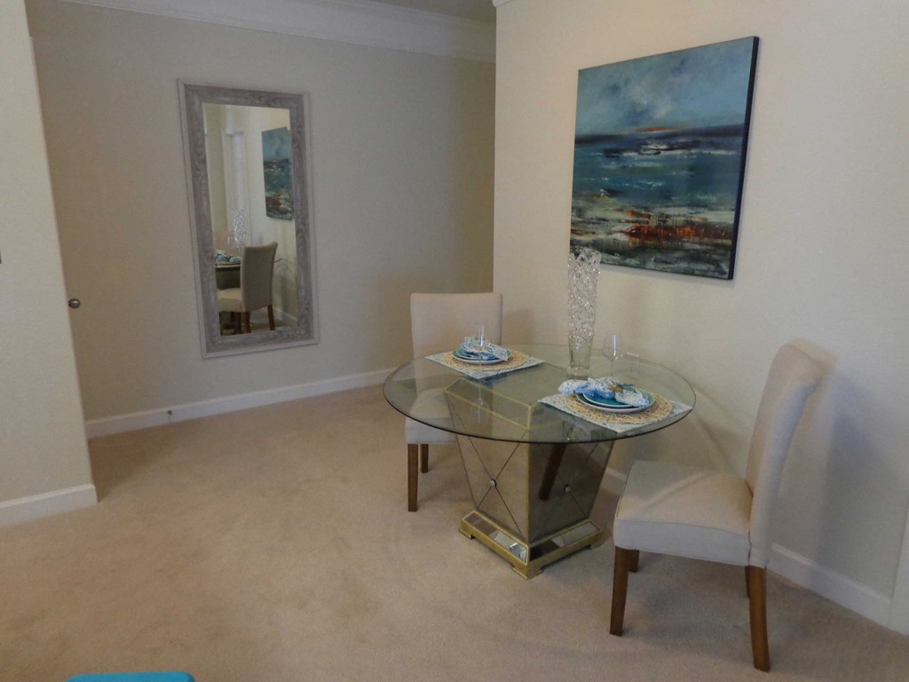 Dining area in apartment home at 900 Acqua Senior Apartment