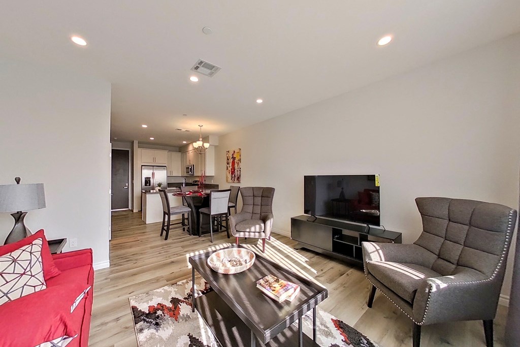 a living room with a couch and a tv