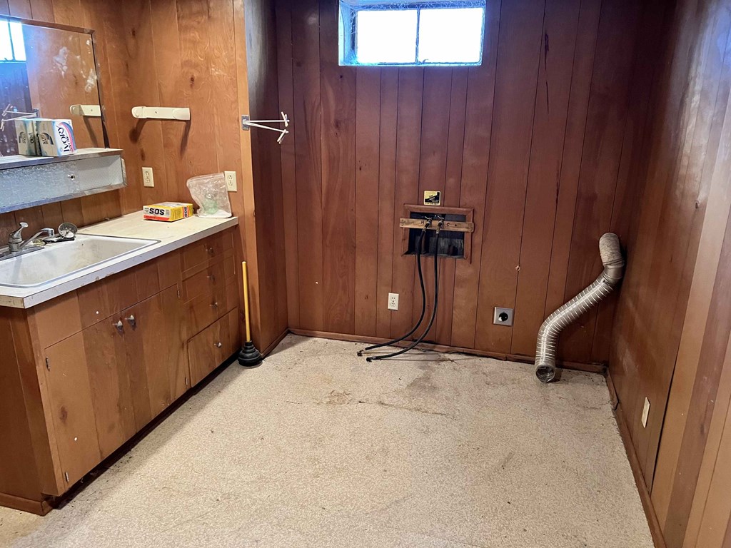 a bathroom with a sink and a toilet in it