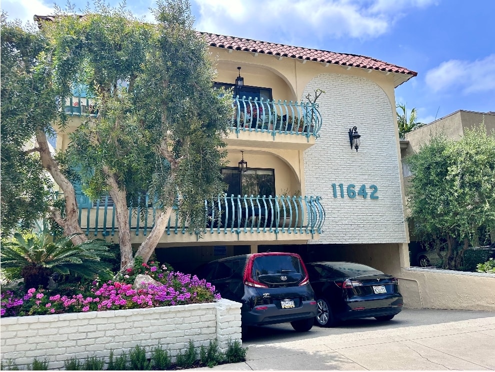 A white building with the number 11642 on it.
