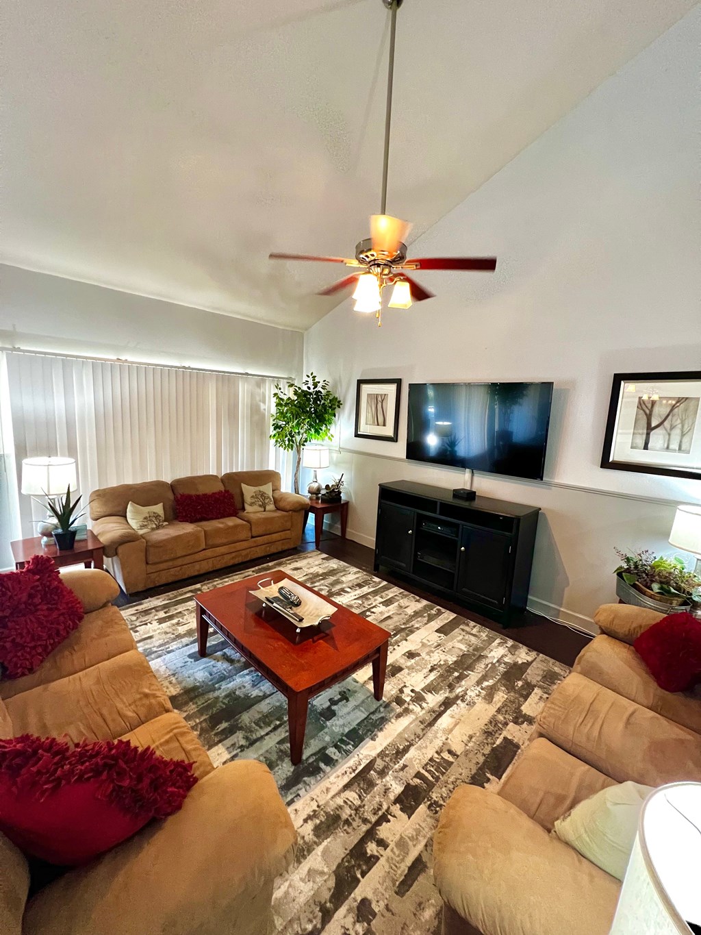 another view of the living room with couches and a coffee table