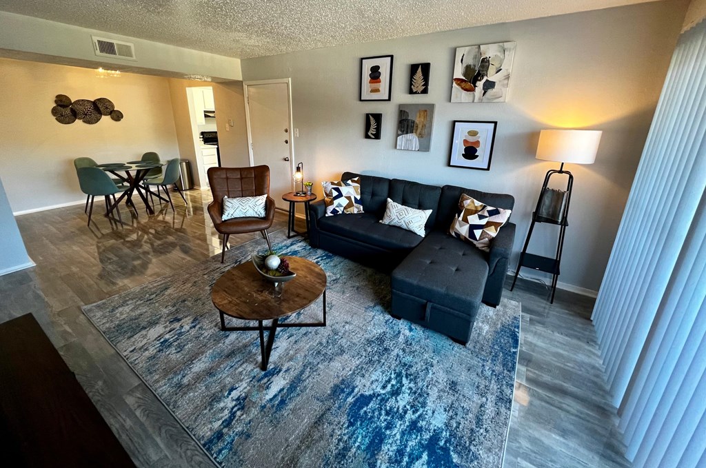 a living room with a couch and a table