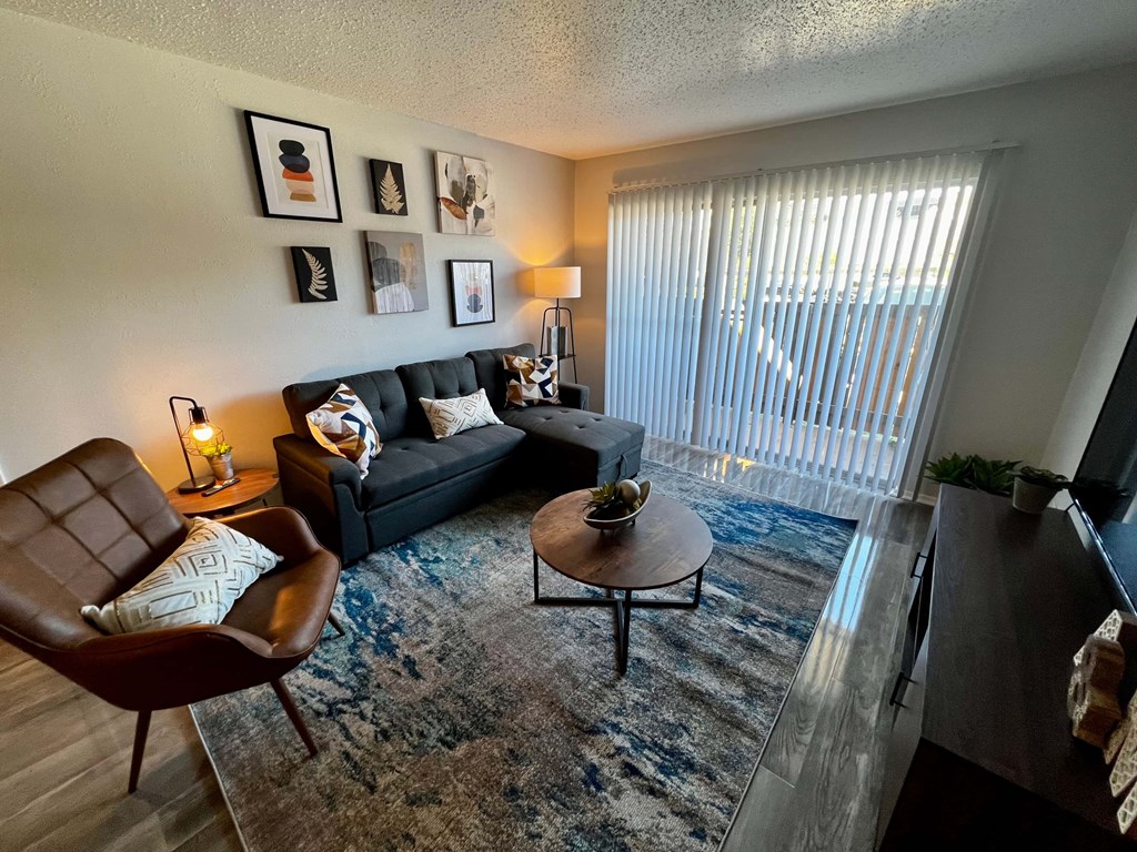 a living room with a couch and a table