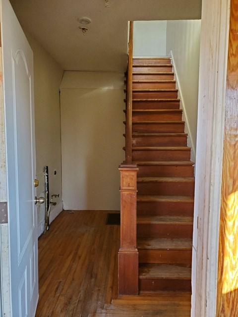 the hall and staircase to the 2nd floor