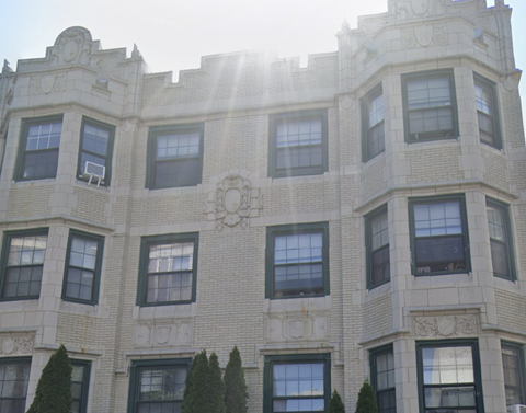 a large white building with a lot of windows