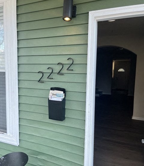 a house with the number 222 on the side of it