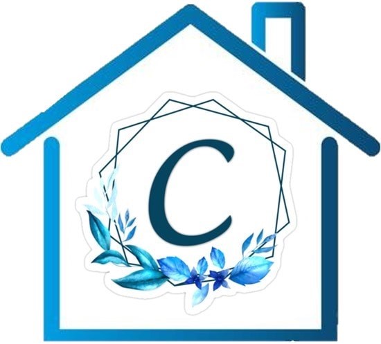 A blue house with a wreath and the letter C in the middle.