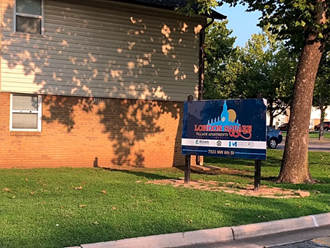 a sign in front of a house for the thunderstruck church