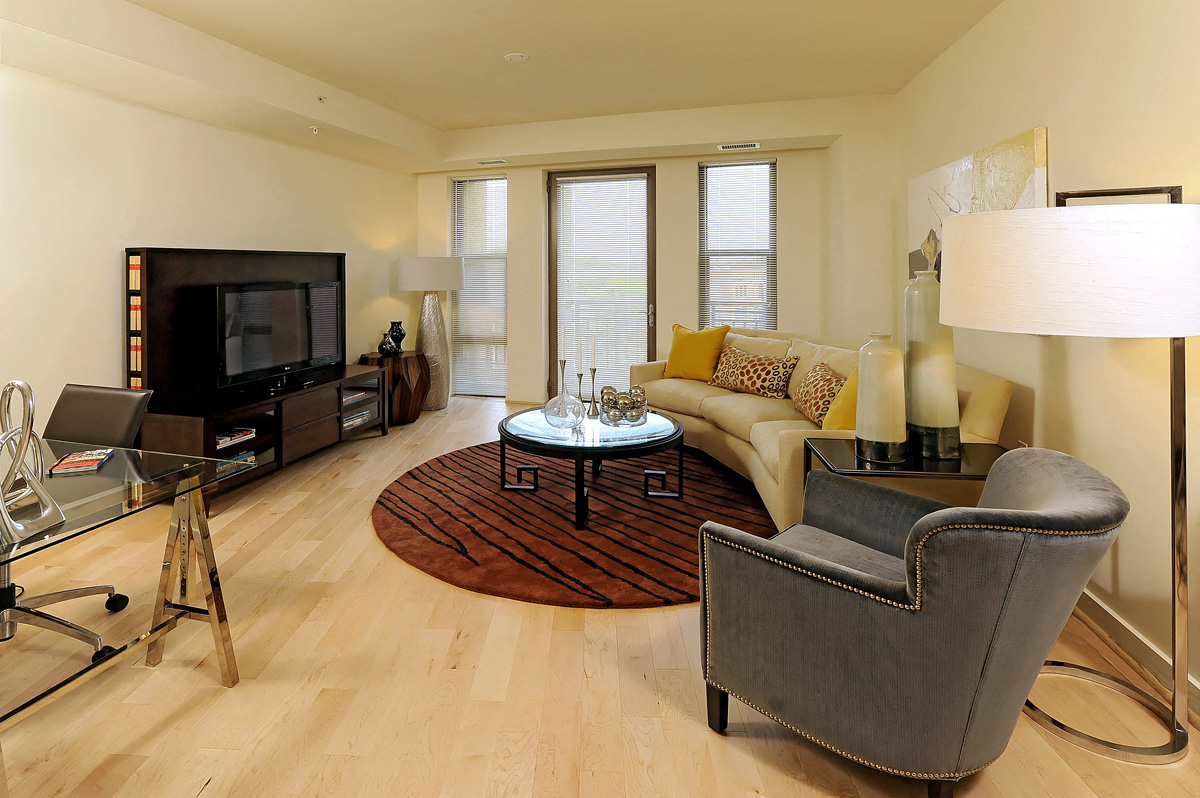 a living room with a couch and a tv