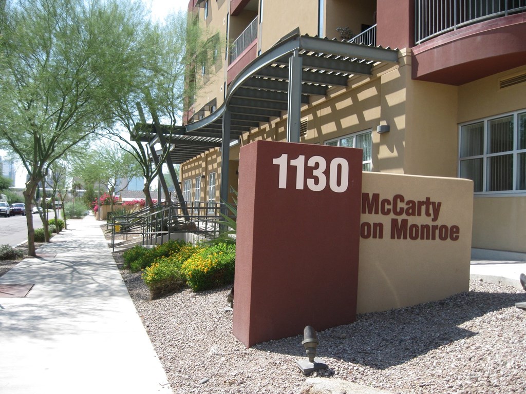 a building with a sign that says 1190 mccarty