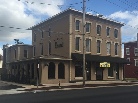 a building on the corner of a city street