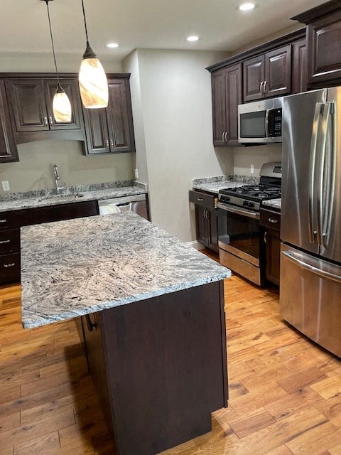 a kitchen with stainless steel appliances and granite counter tops