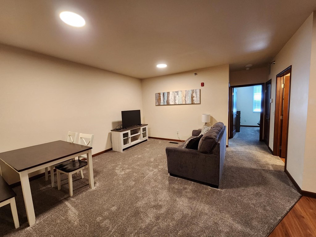 a living room with a couch and a table