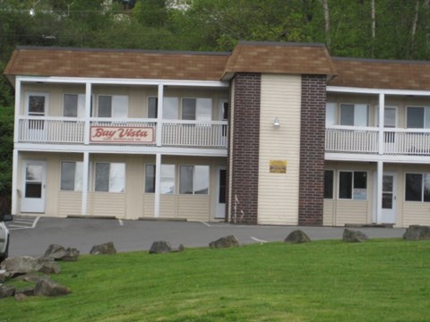 a motel with a sign on the side of it