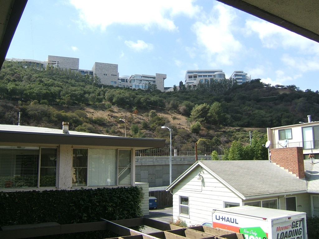 a view of the city from the roof of a house