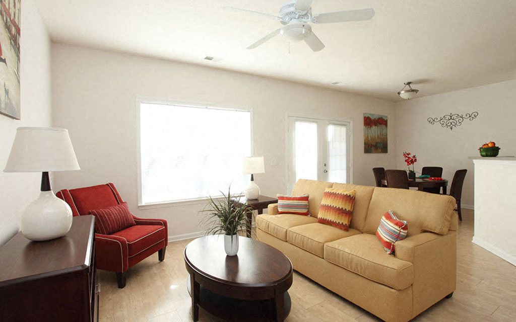 a living room with a couch and a table