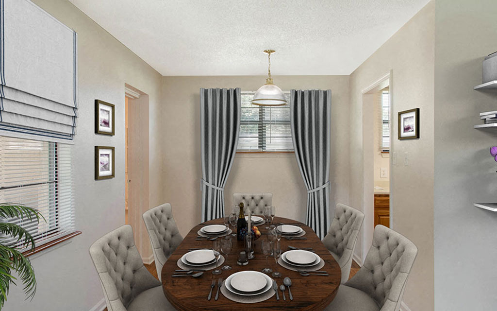 a dining room with a table and chairs