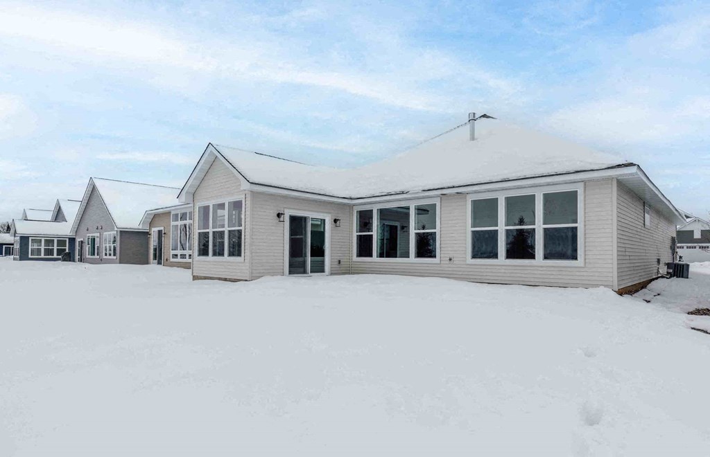 a house with snow on the ground