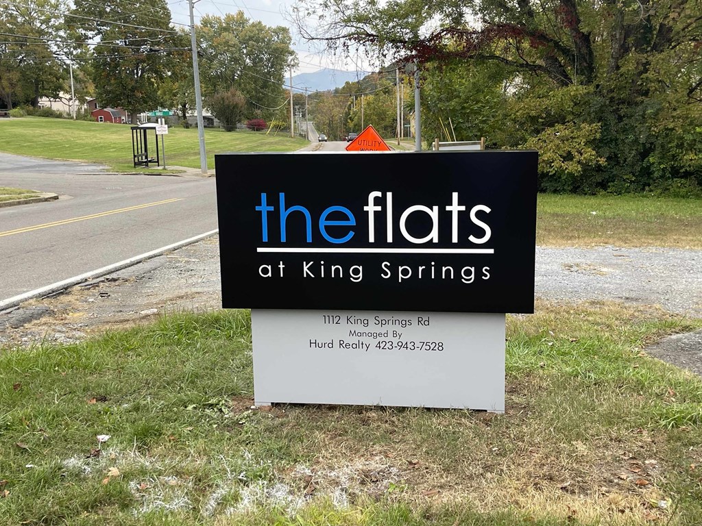 a sign for the flats at king springs