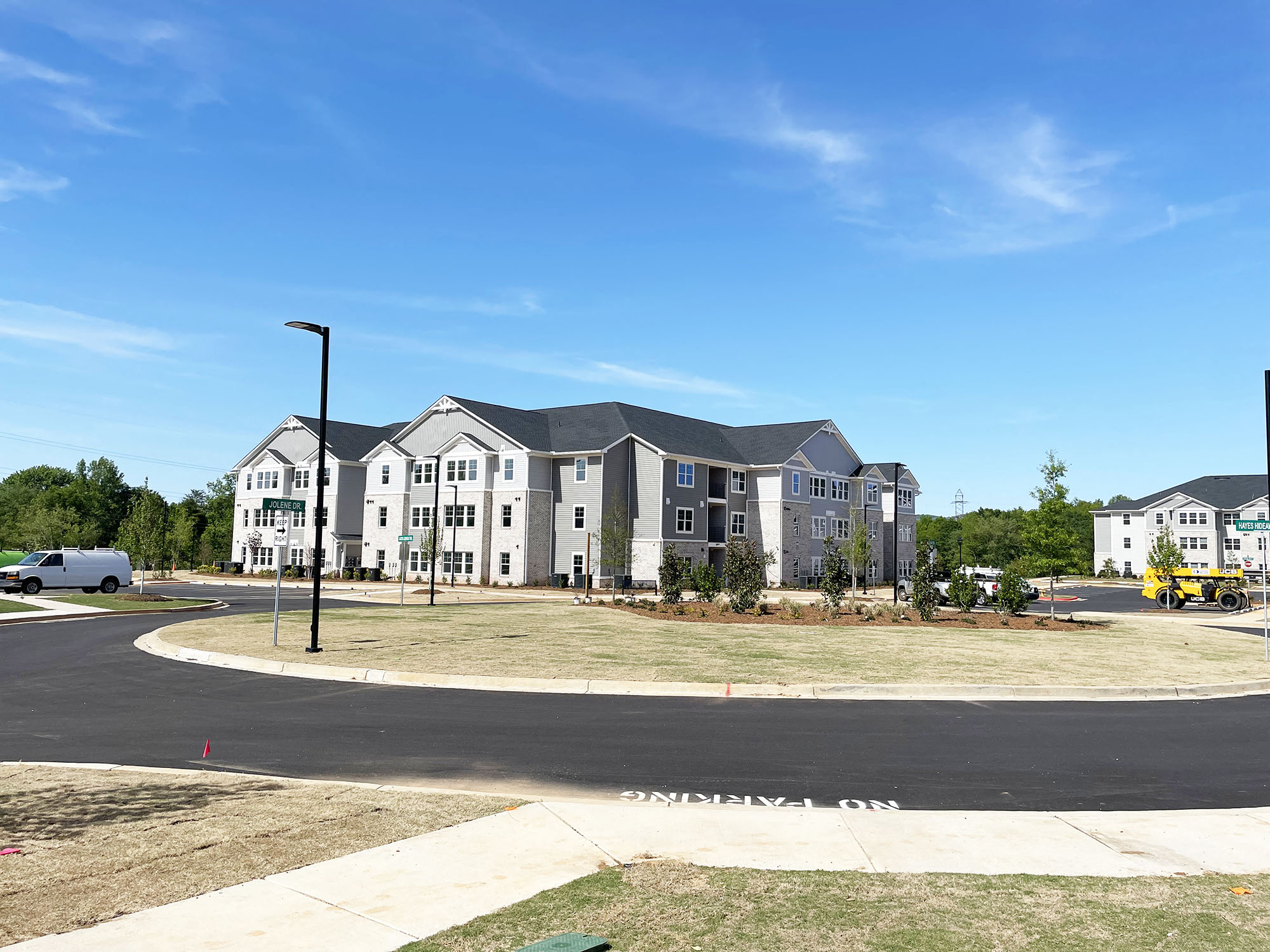 a roundabout in front of an apartment building