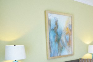 Living Room with Carpet and Opening to Kitchen