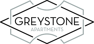 the logo or sign for the apartment building