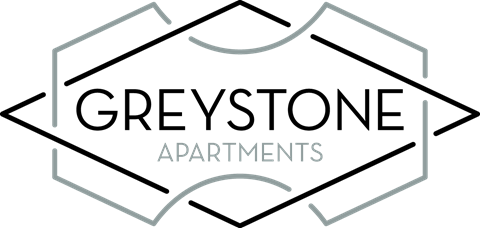 the logo or sign for the apartment building
