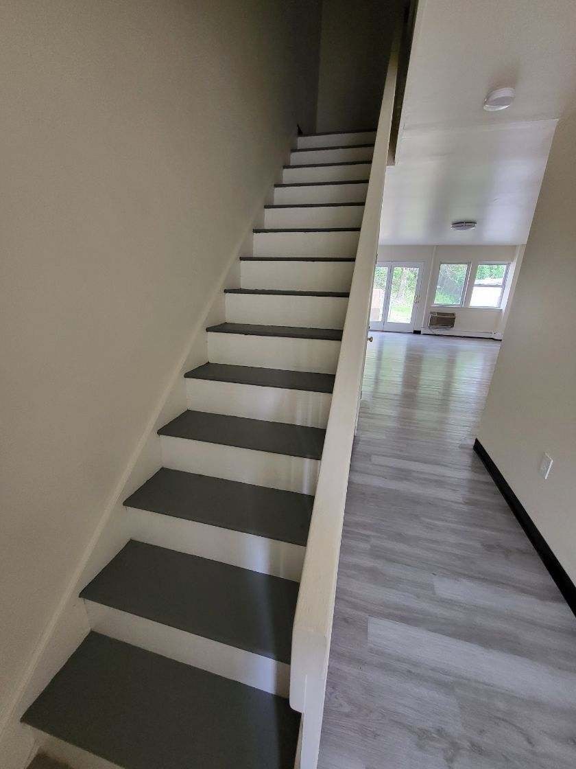 a set of stairs leading up to a house