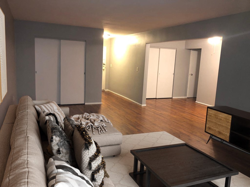 a living room with a couch and a table