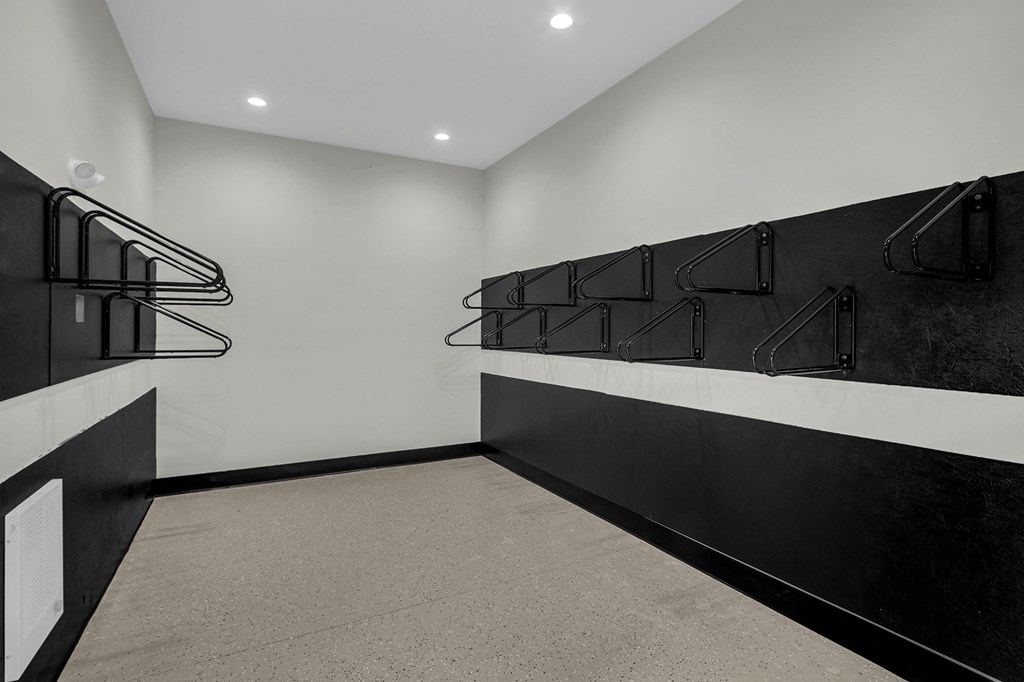 a large room with black and white walls and a black wall with a white wall