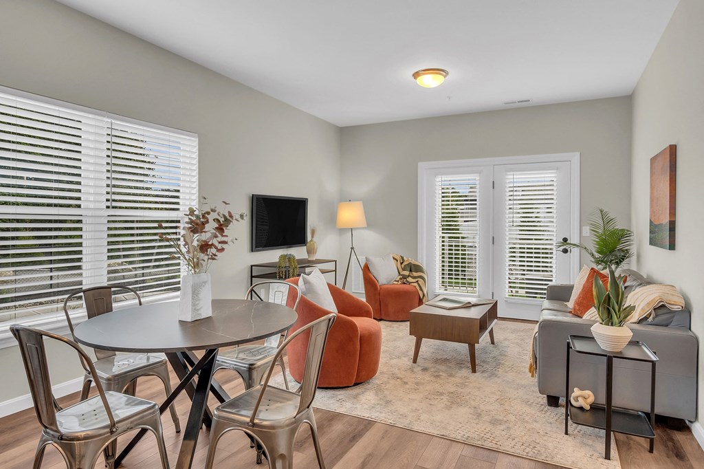 a living room with a couch and a table
