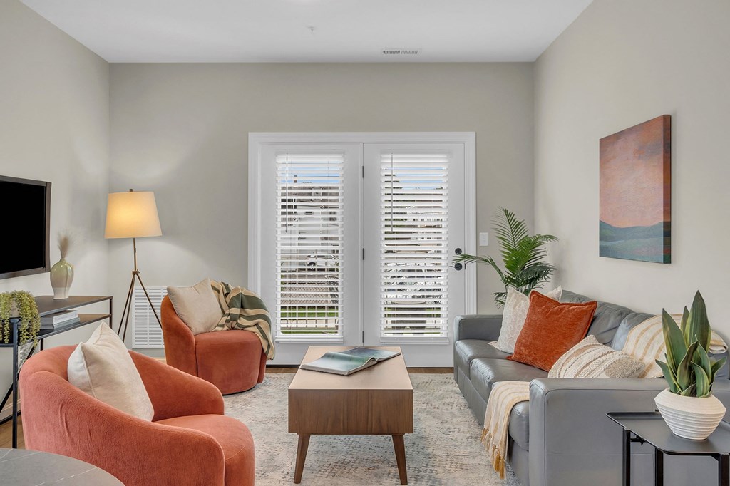 a living room with a couch and a table