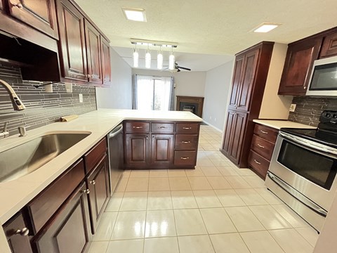 a kitchen with a sink and a counter top