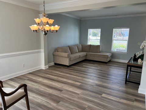 a living room with a couch and a table