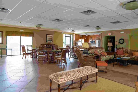 A living room with a sofa, chairs, and a coffee table.