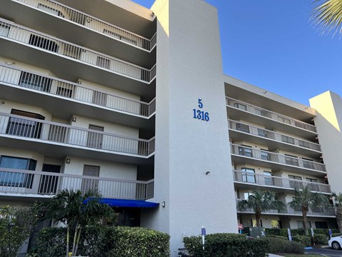 A building with the number 5 on it and 1316 on the other side.