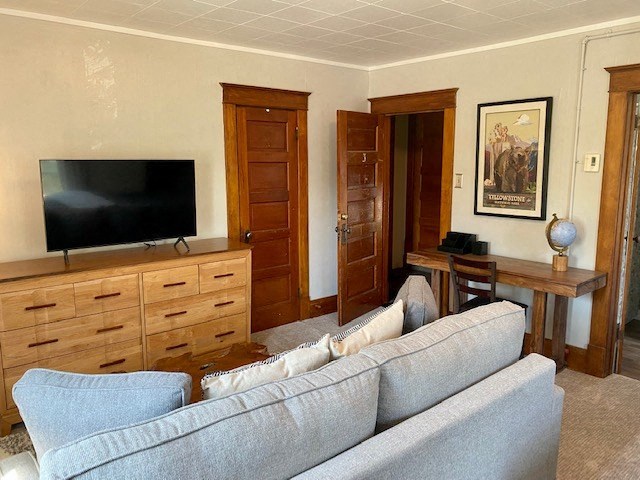 a living room with a couch and a television