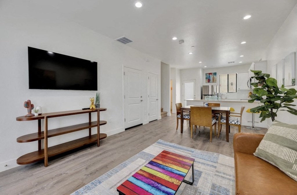 Furnished apartment living area shown at Camelback Townhomes.