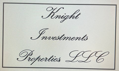 A white card with the words "Knight Investments Properties LLC" written in a script font.