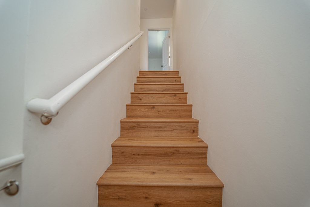 the stairs up to the second floor of a house