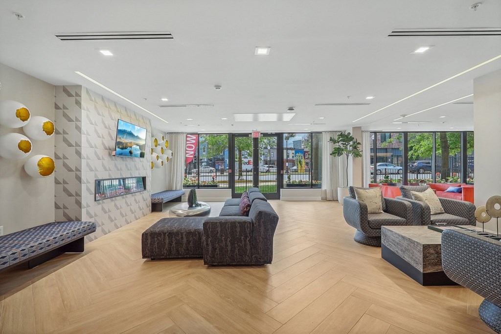 the preserve at cardinal courts spacious lobby with couches and chairs
