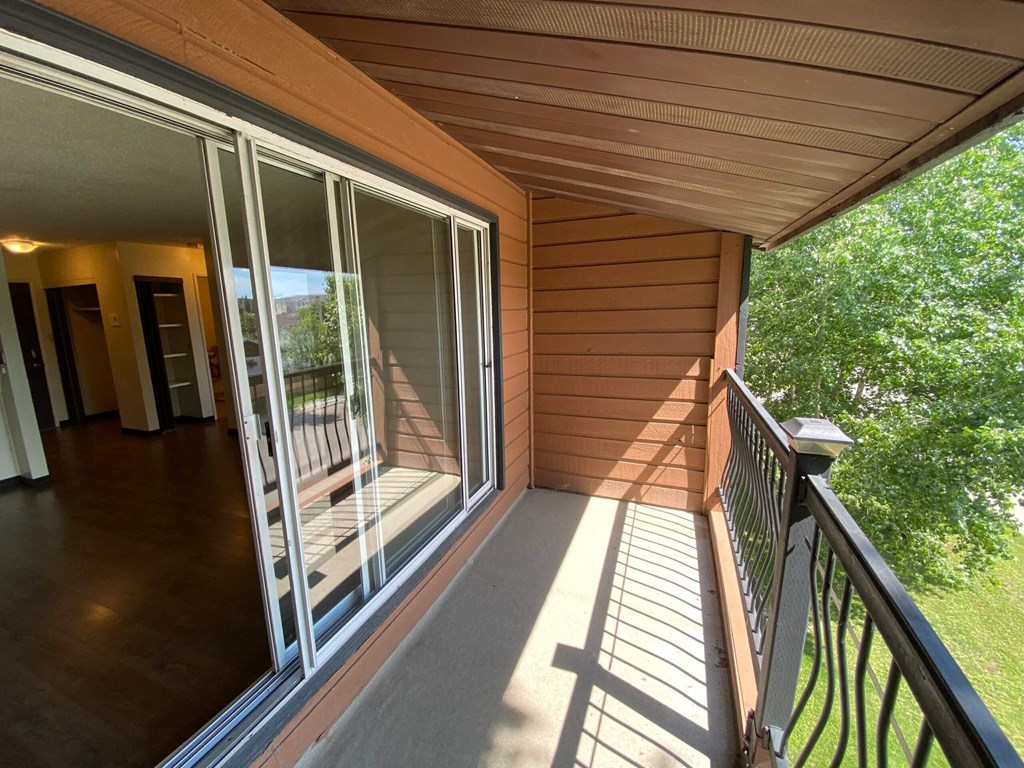 a balcony or terrace in a home with glass doors